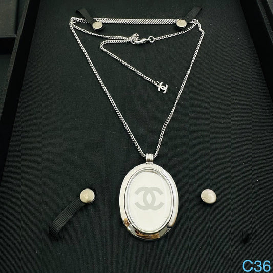 Chanel White Sweater Chain